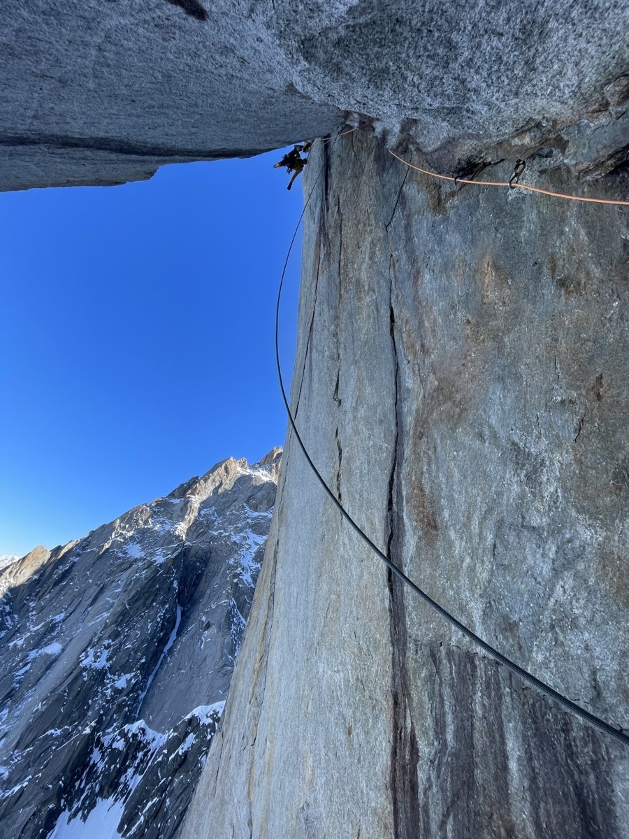 Tom Livingstone on the monster roof on La Croisade, on the North Face of Aiguille des Pélerins. Photo: Symon Welfringer