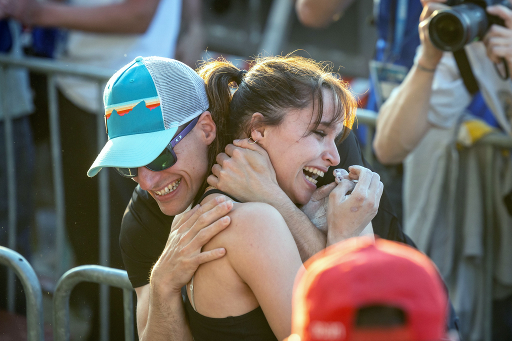 Oriane Bertone celebrates with her coach after winning her first Gold at Prague. Photo: Jan Virt/IFSC