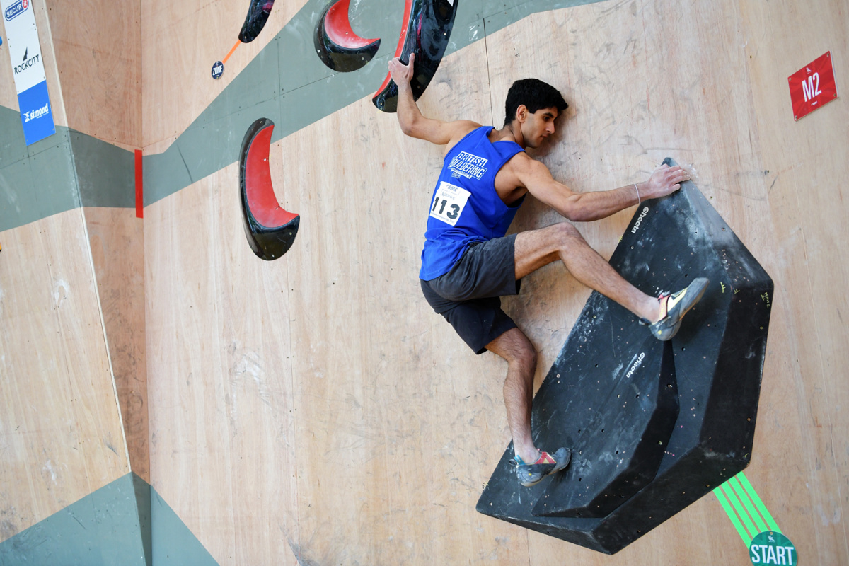 Dayan Akhtar taking the bronze at the British Bouldering Championship. Photo: Keith Sharples