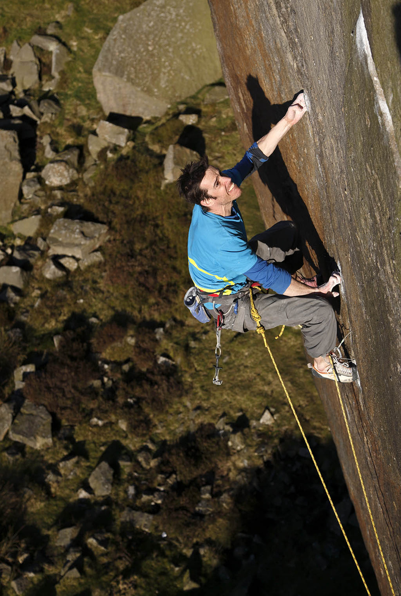 Tom Randall climbing Captain Invincible at Burbage South, Peak District, UK. Photo: © David Simmonite