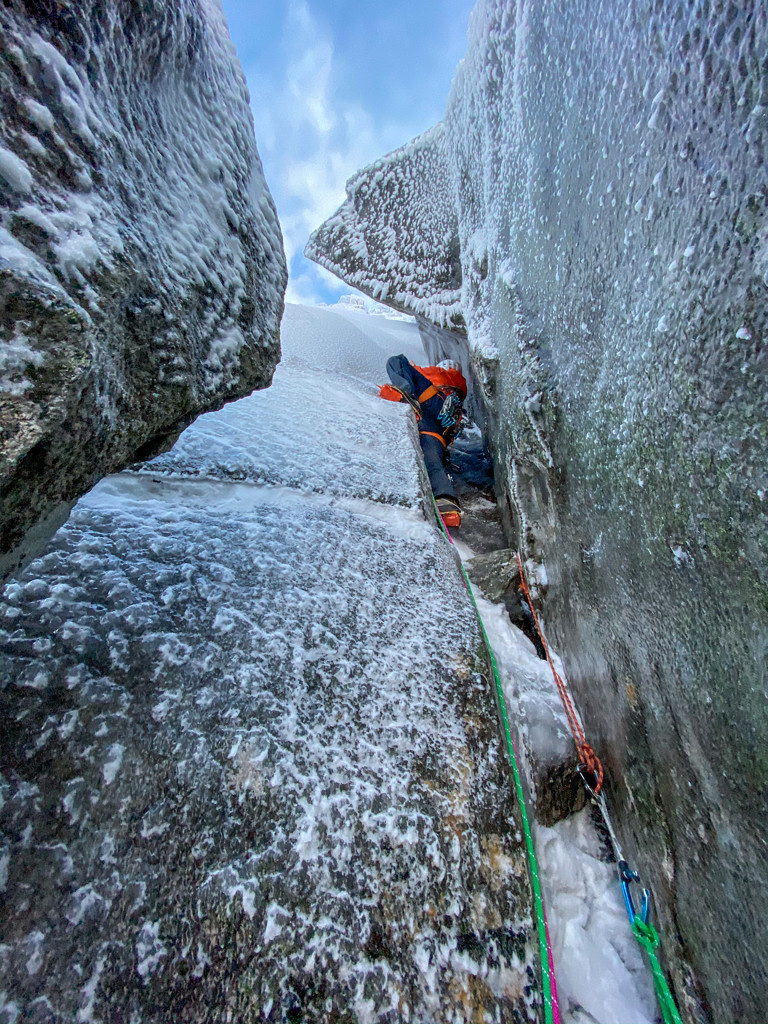 Jeff Mercier engrossed in super-thin climbing on their attempt of There and Back Again, a summer line on Mount Geitgaljen. Boswell and Mercier subsequently bailed out proving  that discretion is the better part of valour in some circumsatances! Photo Greg Boswell