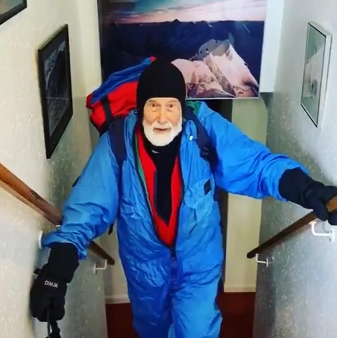 Sir Chris Bonnington climbing his stairs for the Everest Challenge 2020