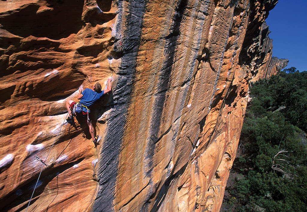 Harry Pennels climbing Mr Joshua (26) towards the right-hand end of Taipan Wall. Photo: © David Simmonite