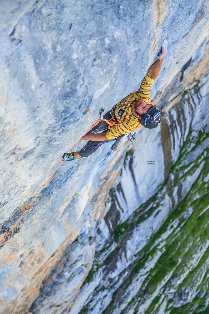 Siebe Vanhee reaching through the first crux of the 35m crux pitch of Fly. Photo: Julia Cassou