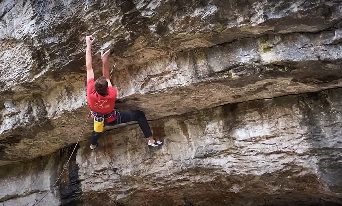 Will Bosi climbing the initail bulges on the first ascent of Brandenburg Gate at Raven Tor. Photo/Screen Shot: Will Bosi