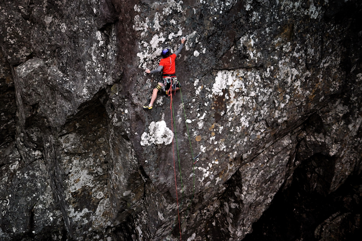 James Pearson on the crucial headwall whilst making the second ascent of Echo Wall. Note this is on the section prior to the "nest of gear" that James placed to protect the upper section. The "third rope" on James' harness is to tension down skyhooks placed as part of that "nest". Photo: OnceUponAClimb