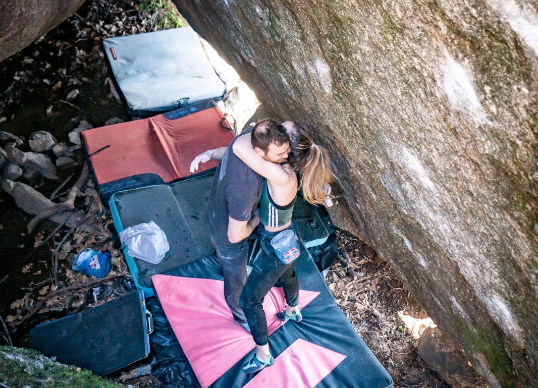 Shauna Coxsey congratulated by husband Ned Feehally after climbing Fotofobia (Font 8B+) in La Pedriza, Spain. Photo: Talo Martin