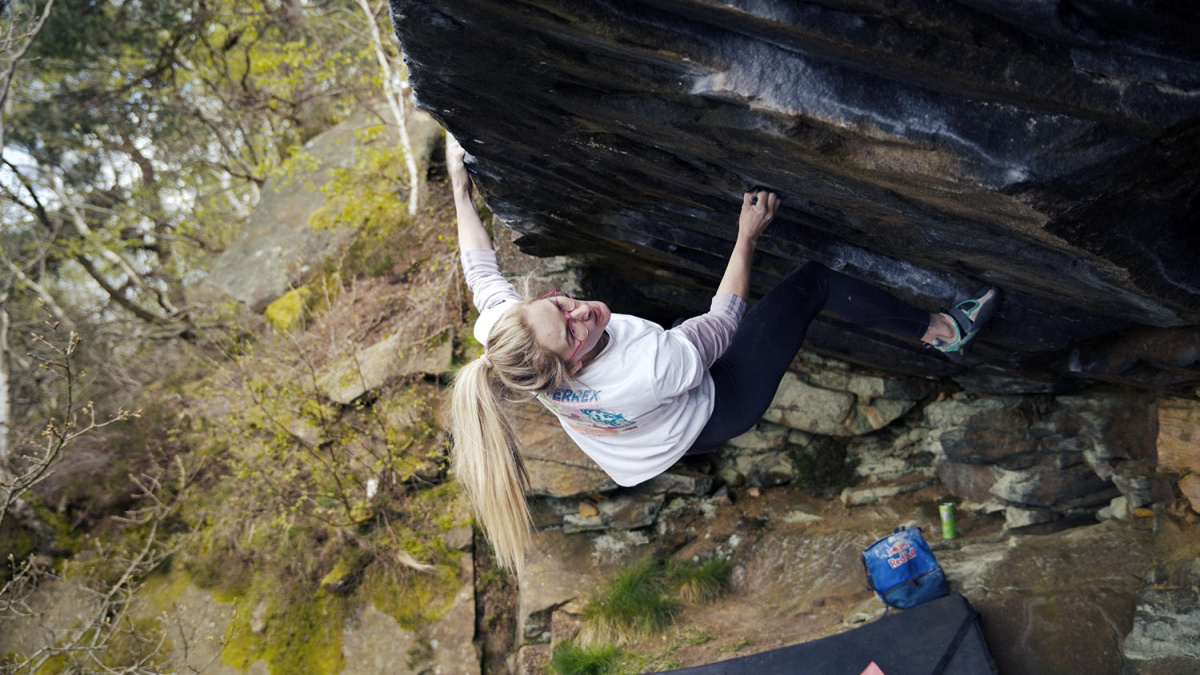 Shauna Coxsey climbing The Boss (Font 8B+/V14) at Yarncliffe Edge, Peak District. Photo: Band of Birds