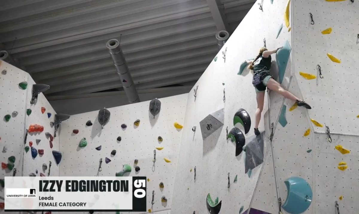 Izzy Edgington (University of Leeds) climbing last and taking the Women top spot in Lead. Screen Shot: National Universities YouTube