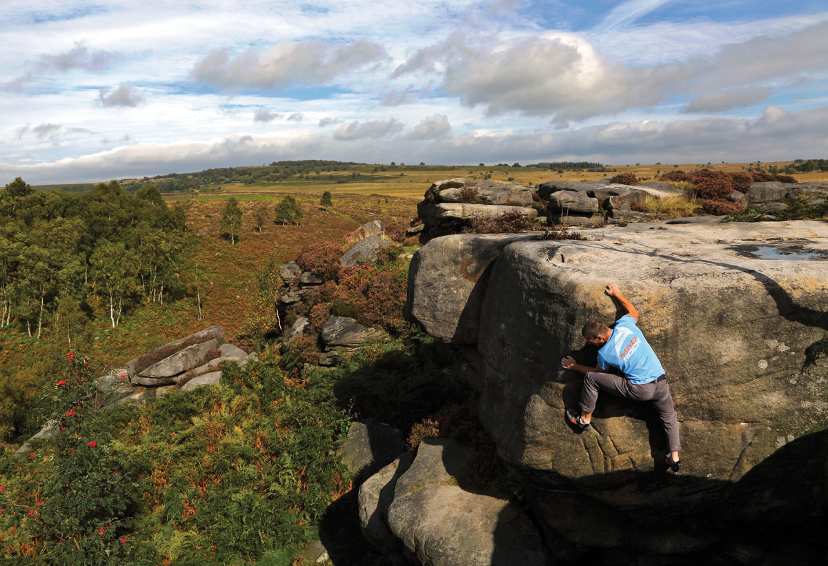 Ledge Wall at Font 5+ is a problem that requires confidence and good footwork. Gareth Parry climbing. Photo: © David Simmonite.