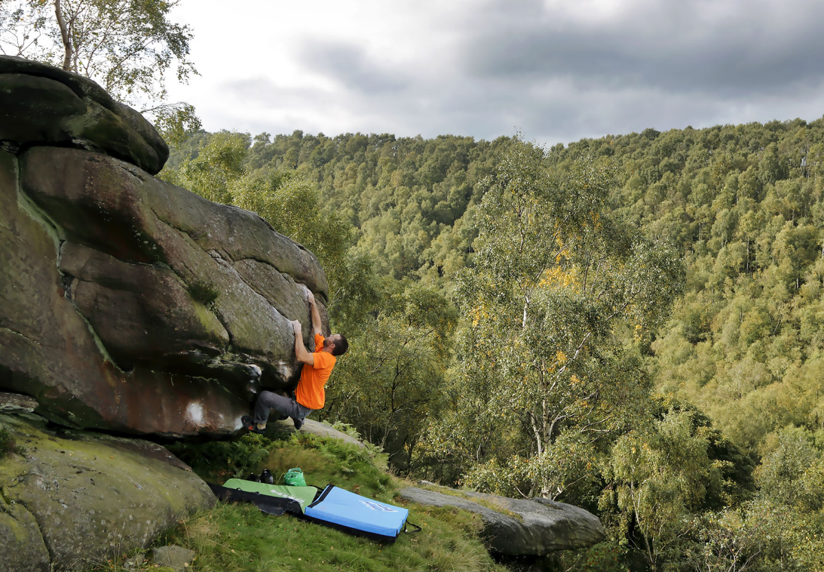 100 metres right of the main area is the cracking but frustrating problem Kidneystone. It can be climbed without a footblock at the start at Font 7B or with it at Font 6C depending how cheesed off you get of falling on the initial crux. Gareth Parry is climbing. Photo: © David Simmonite