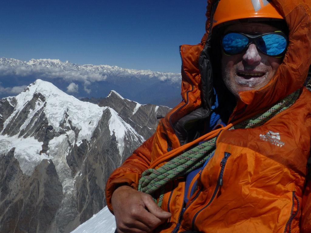 Martin Moran on the summit of Trisula in the Himalaya. Photo: Martin Moran Collection