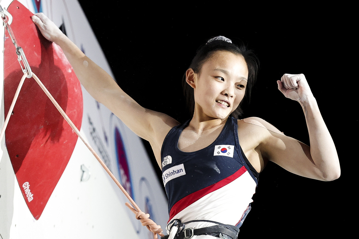 Chaehyun Seo talking the only top on the women’s final route to win her first World Championship. Photo: Dimitris Tosidis/IFSC