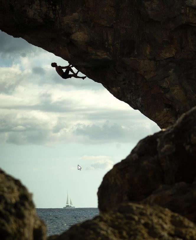 Jakob Schubert on Es Pontas. Photo: @misha.p_photography and @sebastianmarko / @alpsolut.pictures